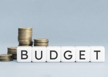 Household budgets TUC the word 'budget' on white blocks with coins