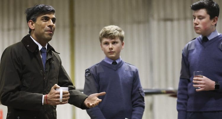 Rishi Sunak looking awkward