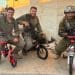 IDF soldiers on childrens bikes