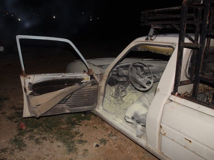 A burned out car after a Knesset hearing about the West Bank