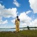 A woman looking at the sky climate finance