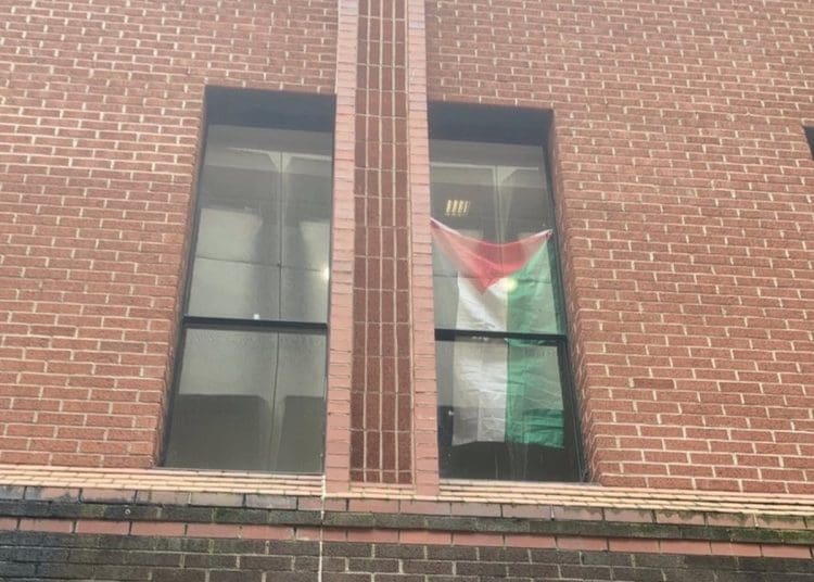 Bristol University occupation a Palestinian flag in a window