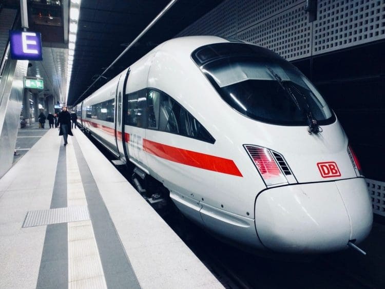 Deutsche Bahn train on a platform workers