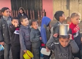 Children queue for food in Gaza Gaza aid maritime corridor Israel
