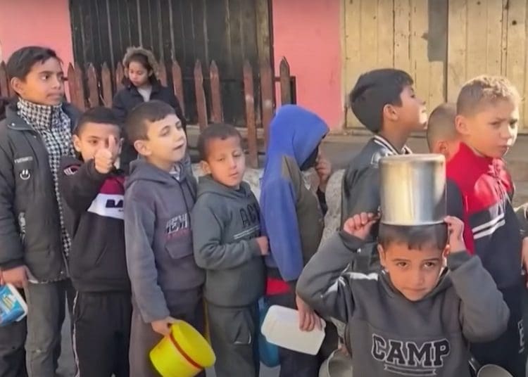 Children queue for food in Gaza Gaza aid maritime corridor Israel