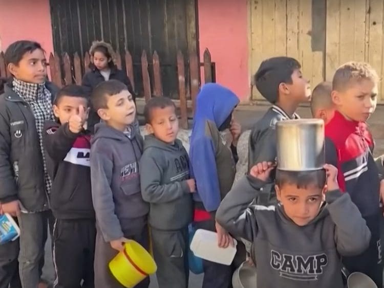 Children queue for food in Gaza Gaza aid maritime corridor Israel