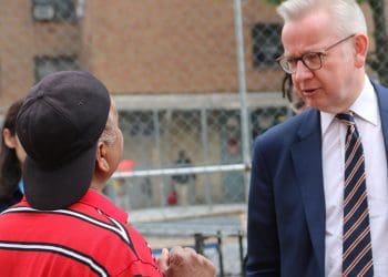 Michael Gove staring at a man extremism definition
