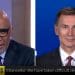 Jeremy Hunt smirking speaking to Trevor Phillips