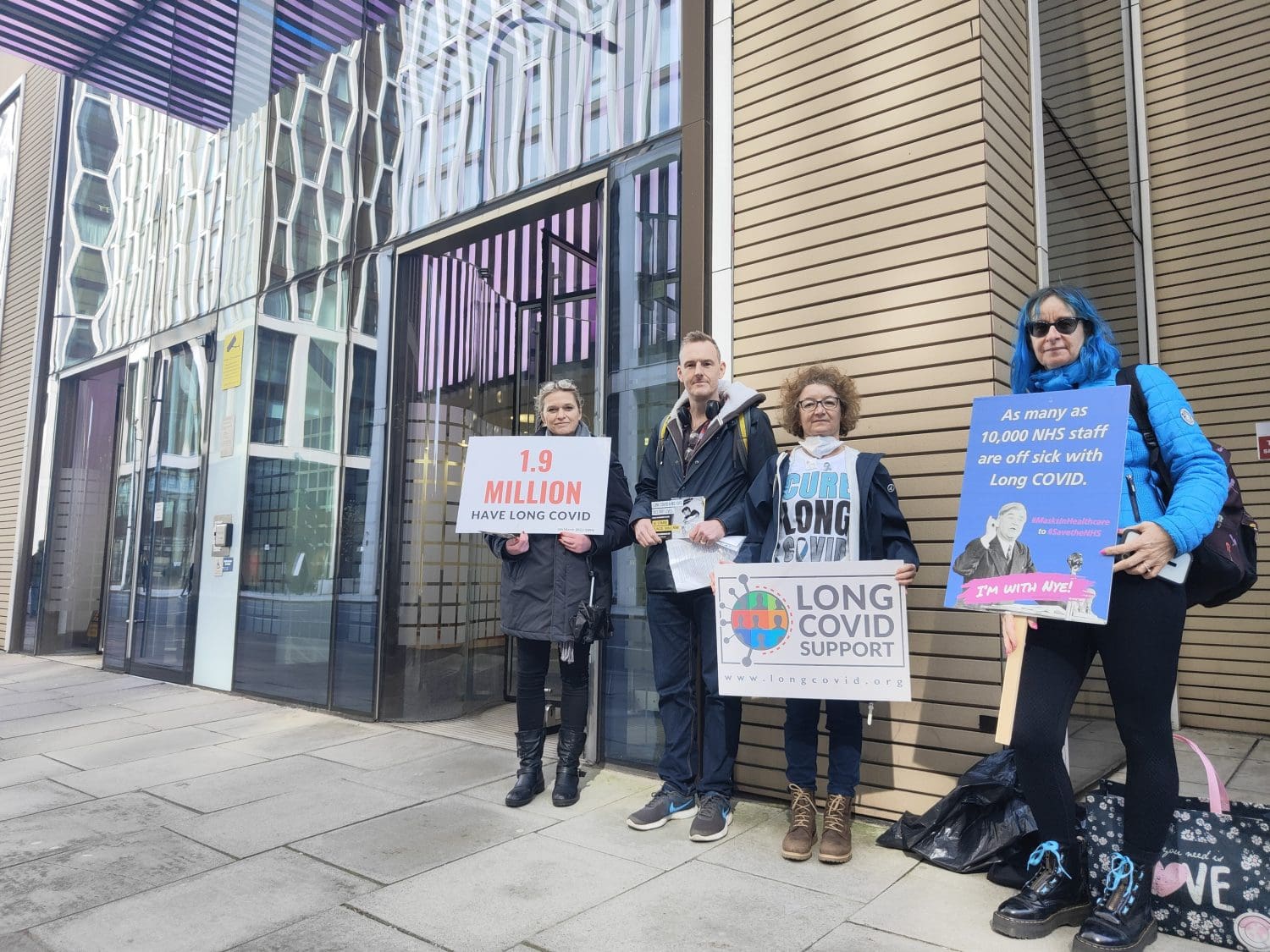 Campaigners with placards outside the department of health