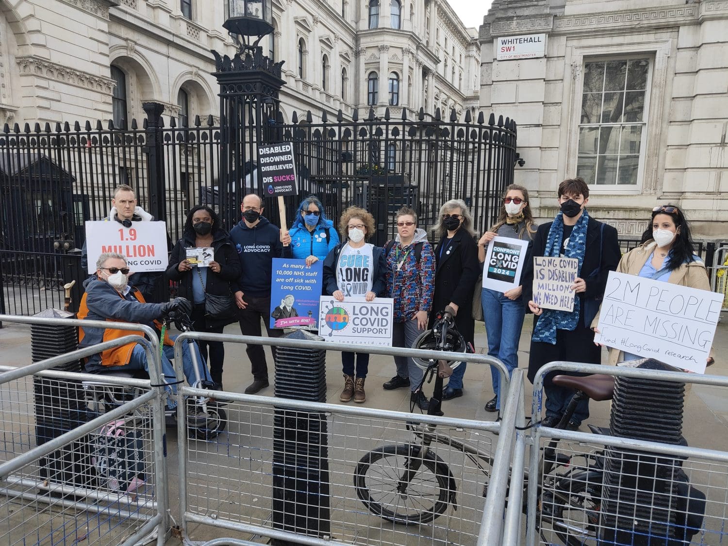 People holding placards outside Downing Street