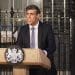 Rishi Sunak looking angry standing at a podium outside 10 Downing street UNCRPD