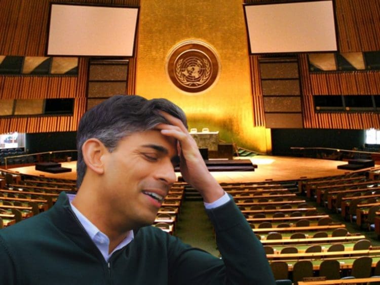 UN general assembly hall with Rishi Sunak inside holding his head with his hand UK government