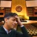 UN general assembly hall with Rishi Sunak inside holding his head with his hand UK government UNCRPD