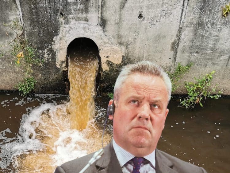 Thames Water boss Chris Weston looking up at a drain pouring out shit