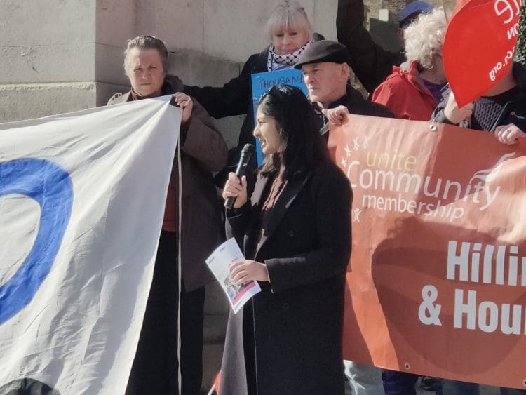 Zarah Sultana speaking at an energy bill protest at parliament