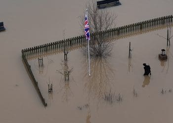 flooding with a union jack in the middle Committee on Climate Change