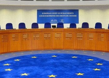 European Court of Human Rights (ECHR) court room, with empty chairs.