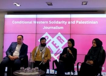 Panelists speak at the Give Over event in London on "Conditional Western Solidarity and Palestinian Journalism".