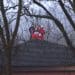 Palestine Action on the roof of Teledyne arms manufacturer that supplies Israel