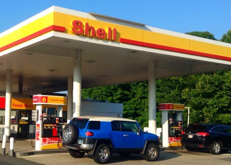 Shell petrol station with cars using it
