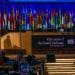Speaker at the podium at a UNESCO World Heritage Day meeting in 2023.