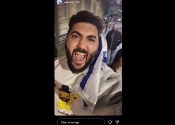 A man with an Israel flag UK universities Gaza