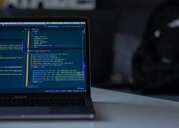 computer with code on screen data backup