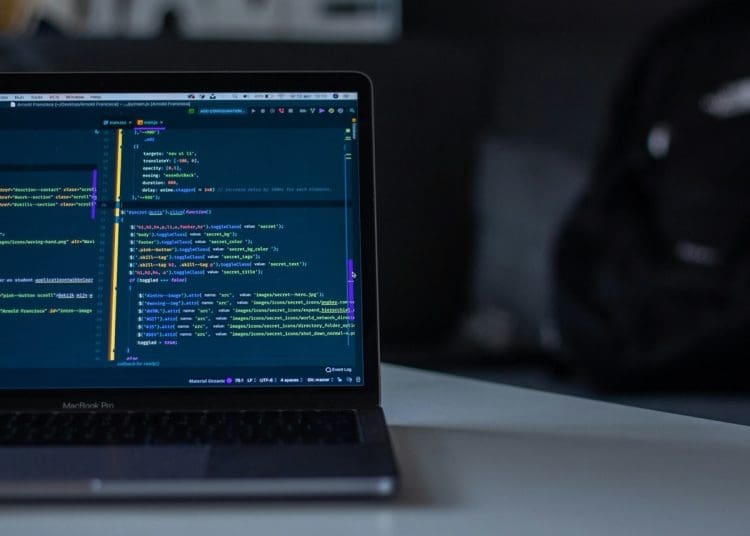 computer with code on screen data backup