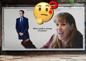 Tories attack ad in which a giant Angela Rayner is holding a hand puppet Keir Starmer. The 'confused face' emoji is superimposed over the image general election