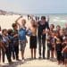 Abubaker Abed with Palestinian children playing football