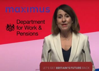 Liz Kendall speaking at a podium with the slogal 'Let's get Britain's future back' during Labour's 2023 annual conference. Maximus, and the DWP logos DWP PIP