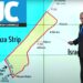 Netanyahu at a press conference with a screen behind him showing a map of Gaza, the Philadelphi Corridor, the Rafah Crossing, Israel, and Egypt. The Jewish Chronicle logo fake