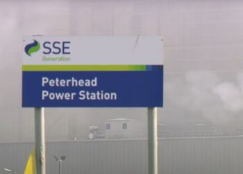 Sign for SSE Peterhead Power Station, with smoke in the background carbon capture and storage