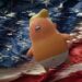 Fragmented US flag, with Trump baby blimp flying in front of it.