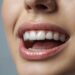 A photo of a woman's open mouth showing her perfect teeth