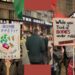 John Healey was at the ADS arms industry dinner - and so were protesters