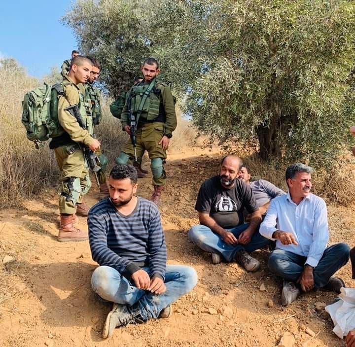 Israeli military with Ghassan and other farmers when they refused to leave their land.