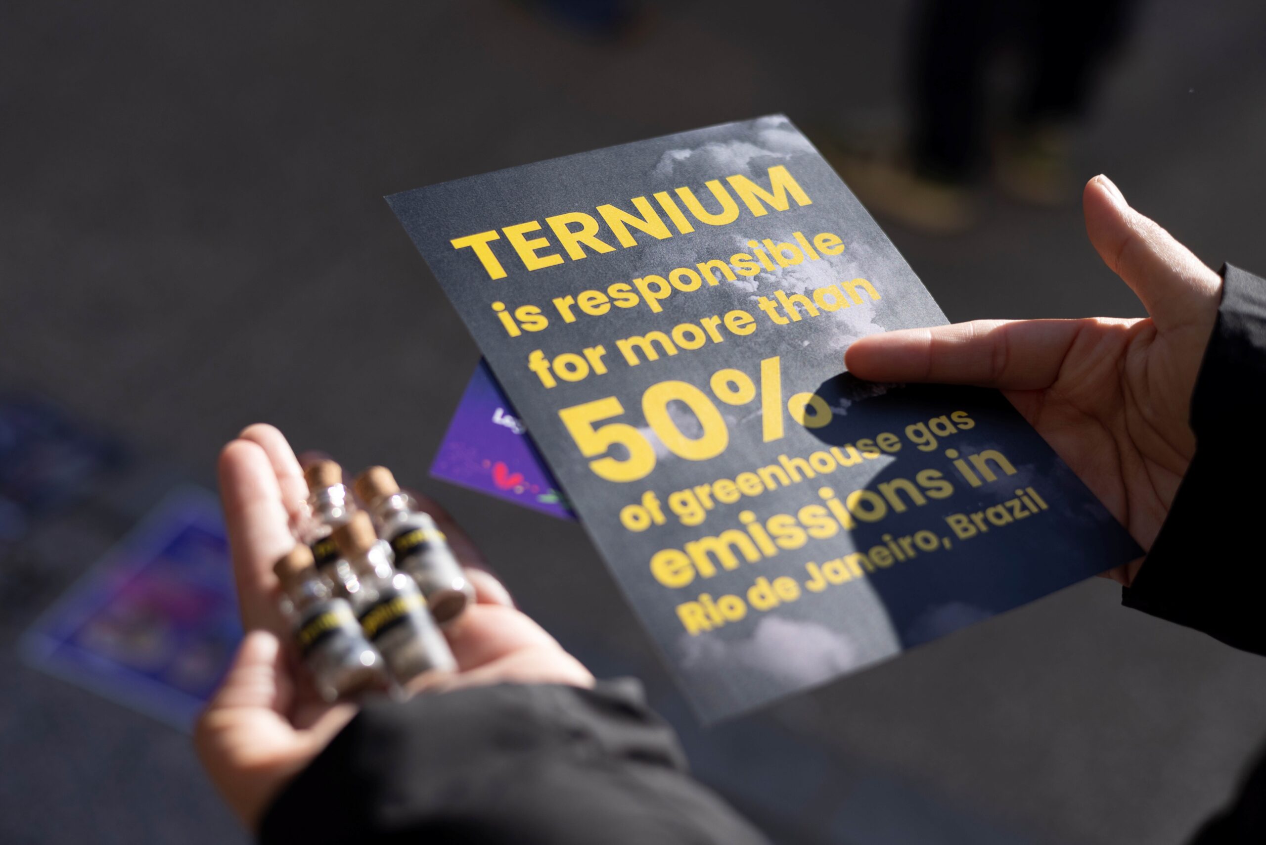 Flyer reading: Ternium is responsible for more than 50% of greenhouse gas emissions in Rio de Janeiro, Brazil".