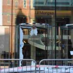 JP Morgan front doors completely shattered with glass everywhere by Palestine Action