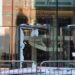 JP Morgan front doors completely shattered with glass everywhere by Palestine Action