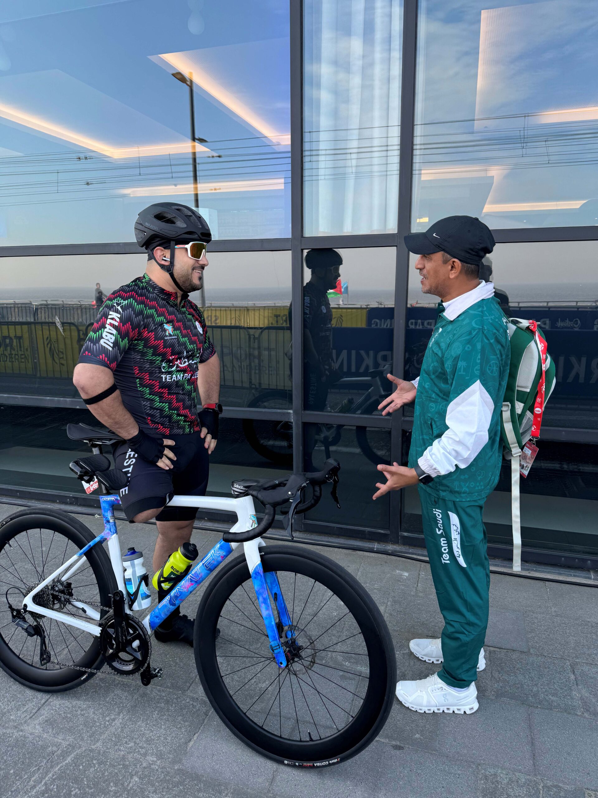 Alaa al-Dali meeting manager of Saudi Arabia's para-cycling team Gaza Sunbirds world cup