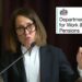 Liz Kendall speaking at a podium. DWP logo.