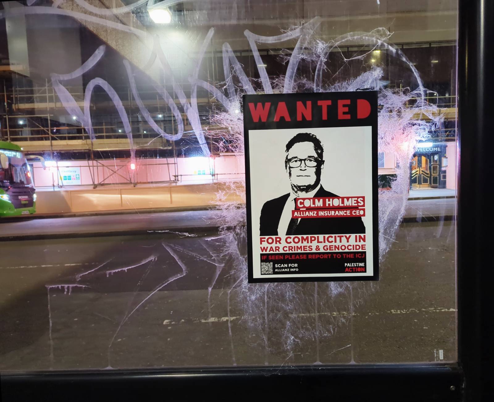 Poster of Allianz CEO Colm Holmes, which reads: "WANTED: For complicity in war crimes and genocide... If seen please report to the International Court of Justice (ICJ)".