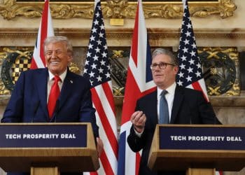 Donald Trump smiling and Keir Starmer standing next to him
