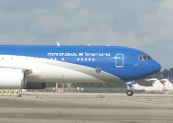 State of Israel's 'Wings of Zion' plane taxiing along a runway.