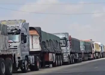 Trucks carrying aid for Gaza that Israel has blockaded at crossings it has closed.