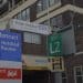 Poole Hospital sign over its ambulance ramp entrance.