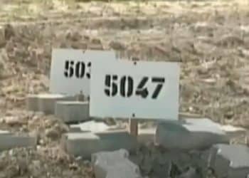 Cemeteries of numbers - graves marked with numbers 5047 and surrounded by bricks Israel
