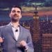 Ben Shapiro standing in front of the New York skyline