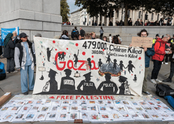 israel murder children - protesters display names
